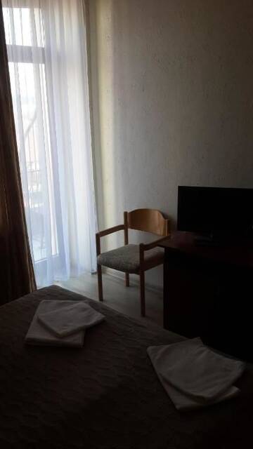 Фото номера Стандартный двухместный номер с 1 кроватью Отель Hotel Helikon г. Яноши 12