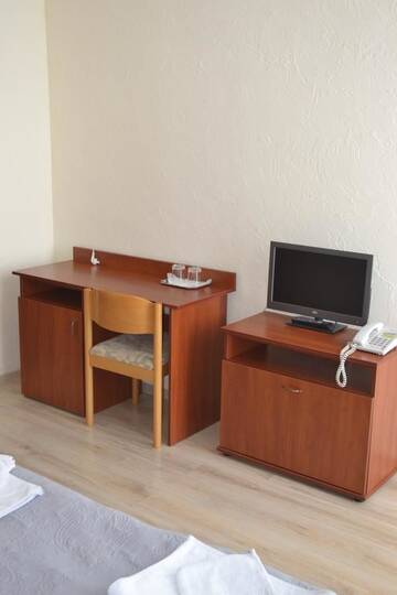 Фото номера Стандартный двухместный номер с 1 кроватью Отель Hotel Helikon г. Яноши 2